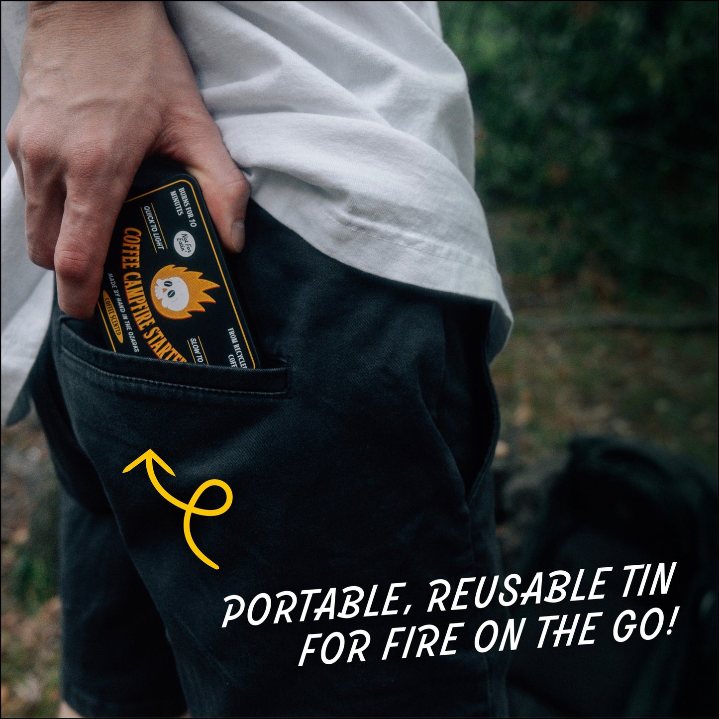 Person holding ROASTIES portable fire starter in their pocket with promotional text. Eco friendly fire starters for camping  and grilling made from coffee husks, waterproof fire starter for fire pit and charcoal grill. Long burn time, eco friendly, fire pits, fire places, grills